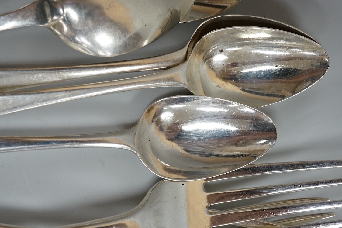 A harlequin part canteen of 19th century Old English pattern flatware, comprising thirty items, all with engraved crest, various dates and makers, 38.1oz.